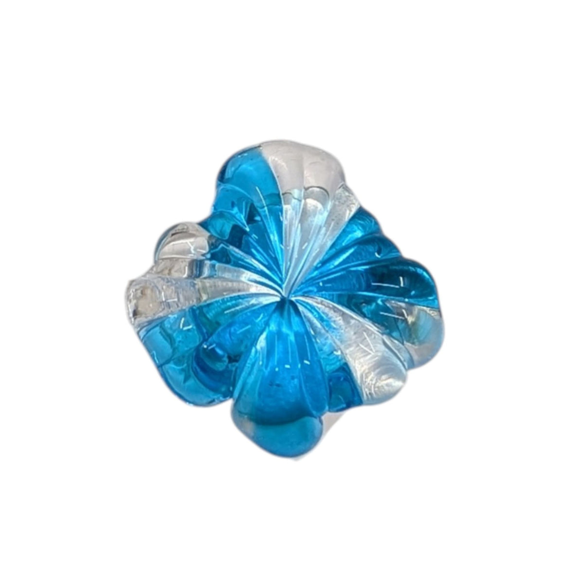 A translucent blue and clear glass flower-shaped decorative ring on a plain white background.