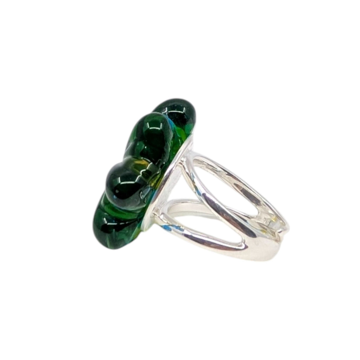 A silver ring featuring a cluster of three glossy, dark green glass beads on a polished silver band, shown against a plain white background.