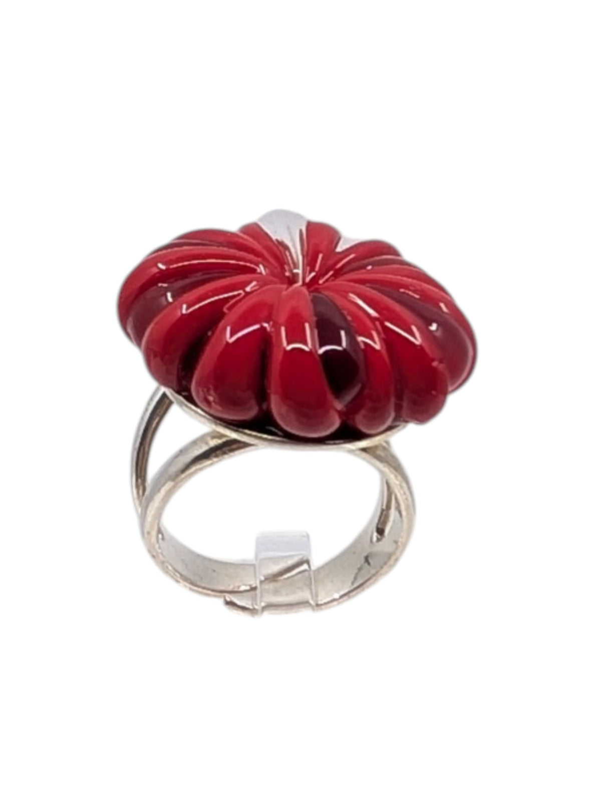 A silver-toned ring featuring a large, glossy red, pumpkin-like flower top, shown on a plain white background.